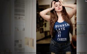 An attractive lass, Kainaat Arora in Tees and denim shorts